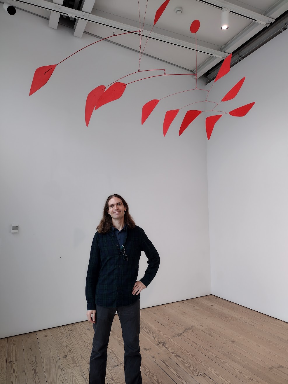 Ben under Alexander Calder's Big Red mobile
