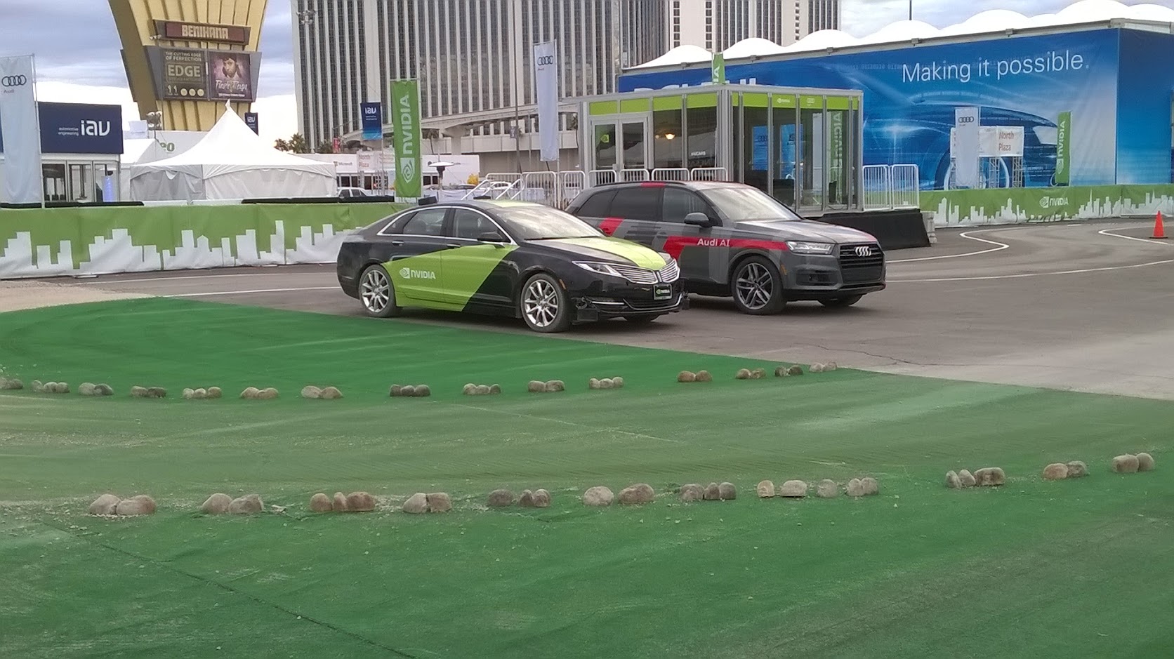 The NVIDIA self-driving car alongside its counterpart from Audi during CES 2017.